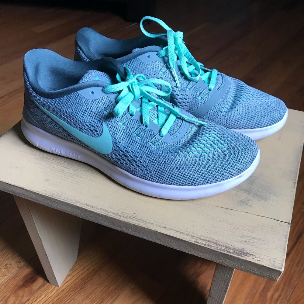 Mint green Nike Free RNs, size 9